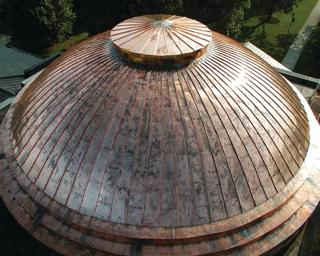 Craftsman Roofing crew installing a new roof in Eastham